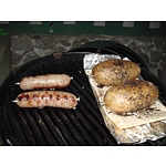 Potato, Brats, and Spud Spikes on BBQ
