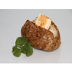 Baked potato with butter and Spud Spikes gourmet seasoning